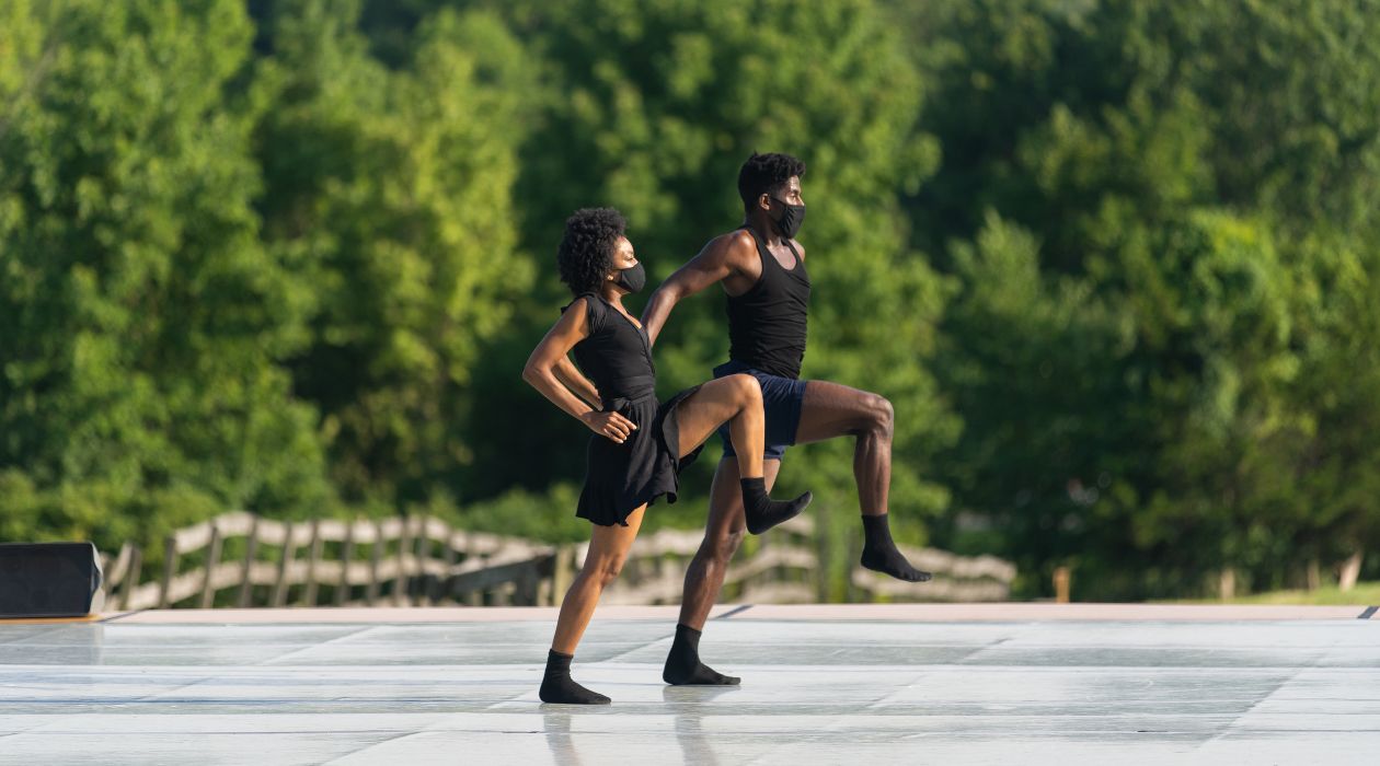 Two dancers performing on outdoor stage at Kaatsbaan Tivoli